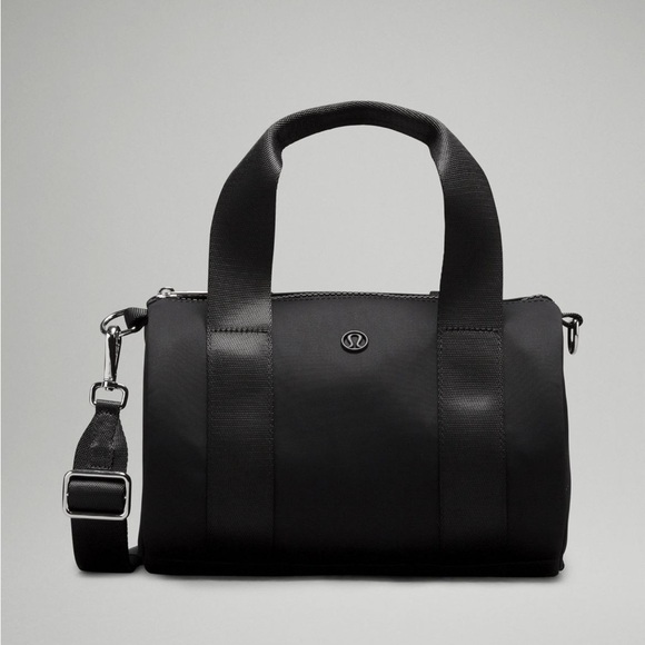 lululemon athletica Handbags - Lululemon knit nylon mini barrel duffel bag